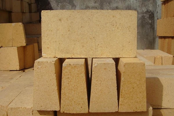 Refractory materials for glass manufacturing