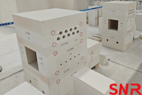 Relationship Between Phase Composition, Corrosion Resistance and Thermal Conductivity of Fused Cast AZS Refractory Materials